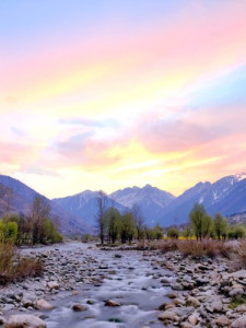Witnessing the breathtaking sight of a river meandering through a valley during sunset is a moment of pure bliss Letting nature's beauty captivate the soul.